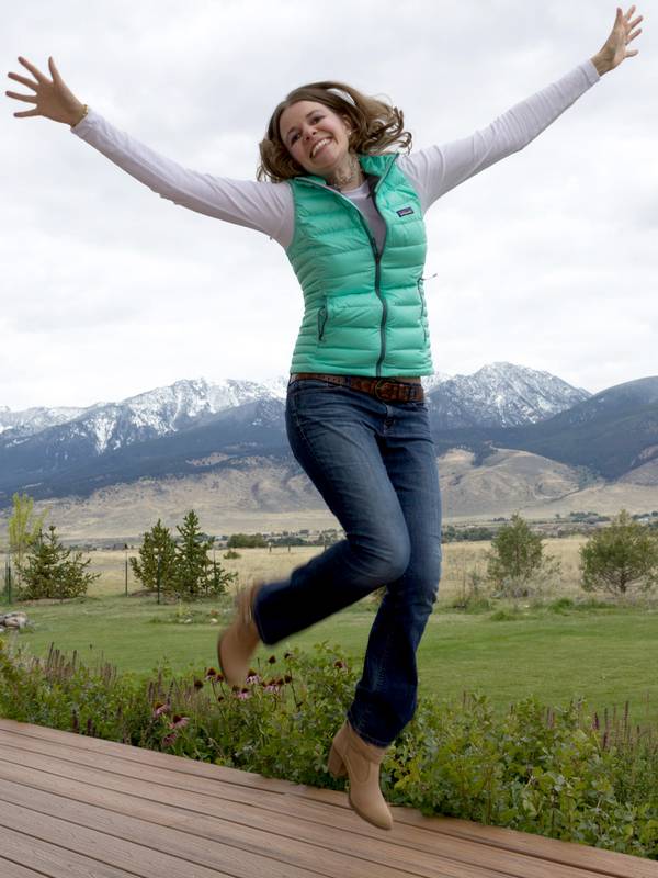 Katie Jumping in Mountains